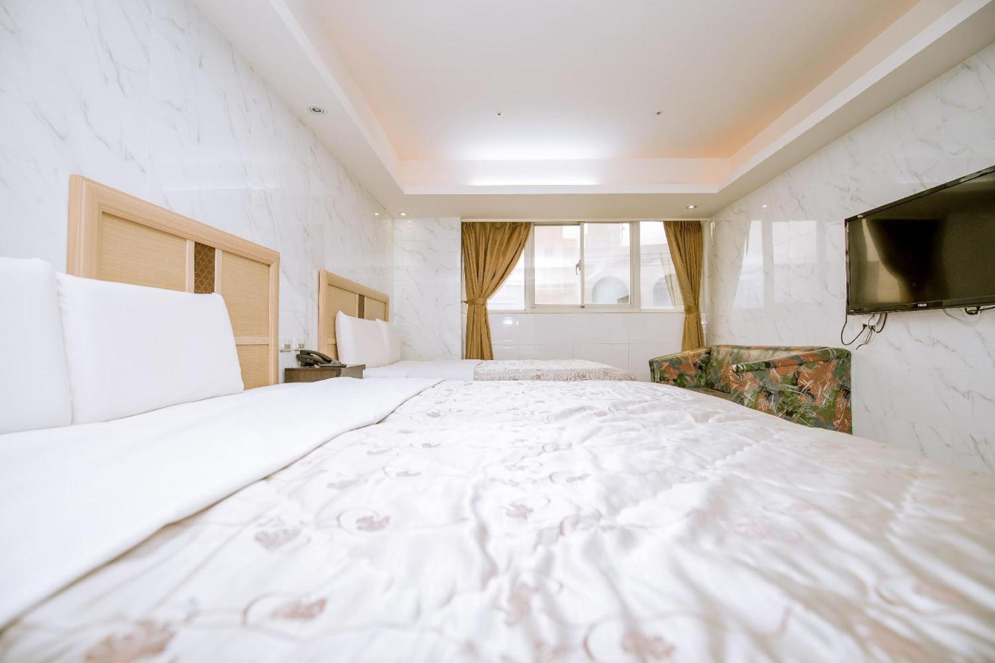 Guide Hotel Taoyuan Fuxing Pokoj fotografie