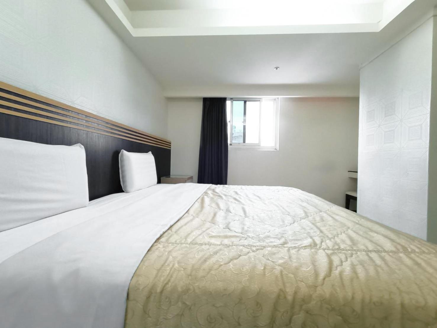Guide Hotel Taoyuan Fuxing Pokoj fotografie