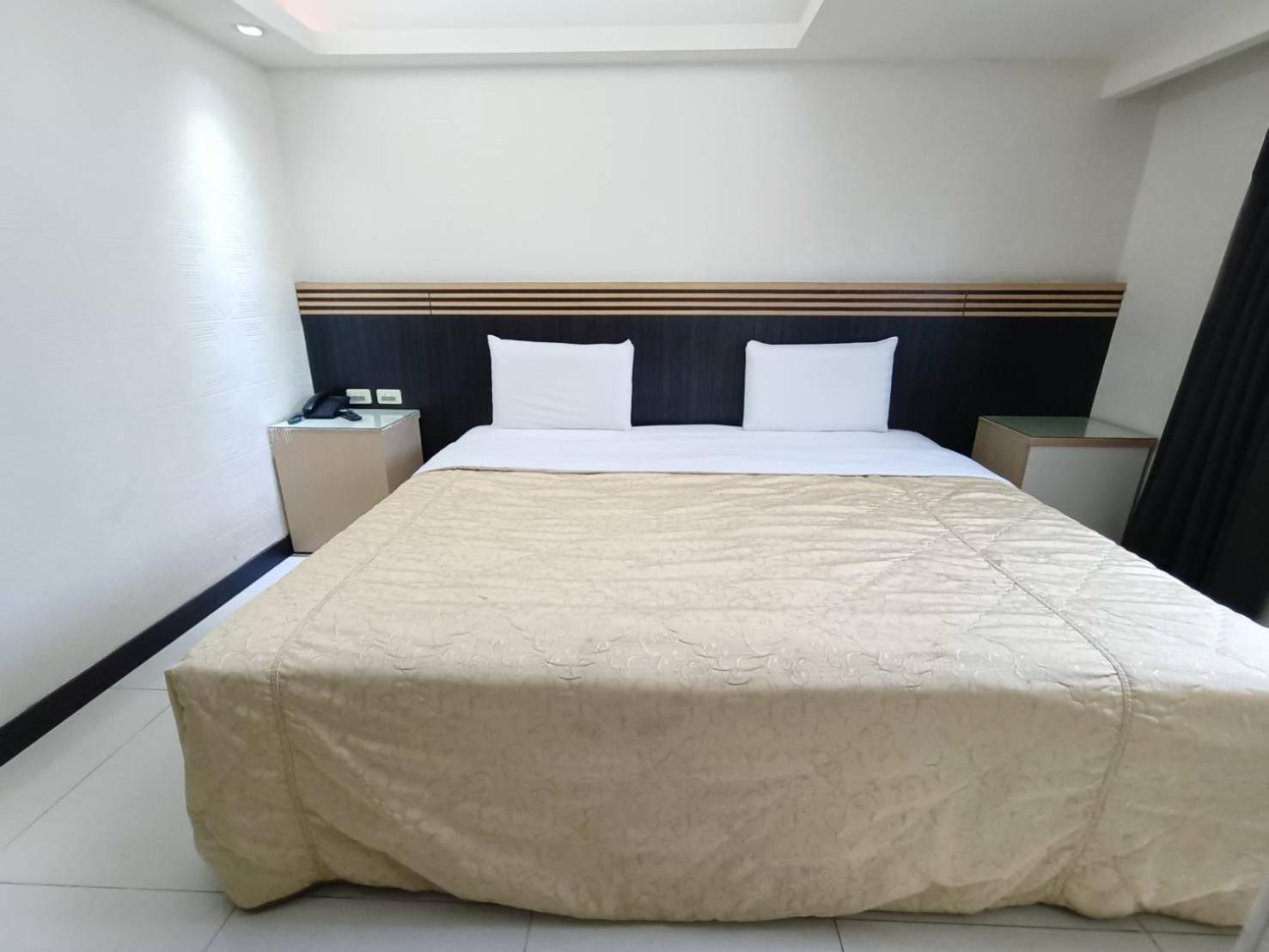 Guide Hotel Taoyuan Fuxing Pokoj fotografie