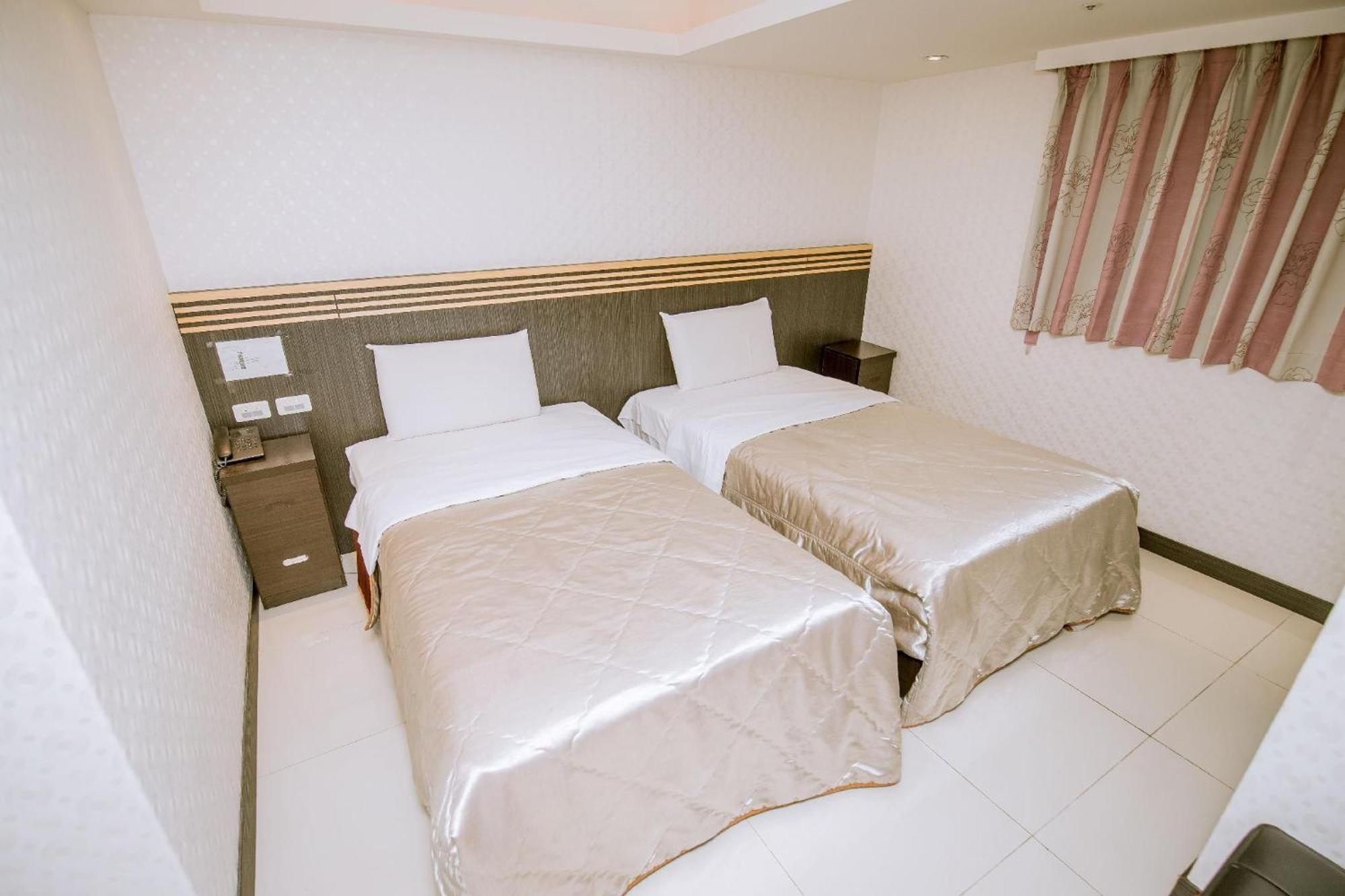 Guide Hotel Taoyuan Fuxing Pokoj fotografie