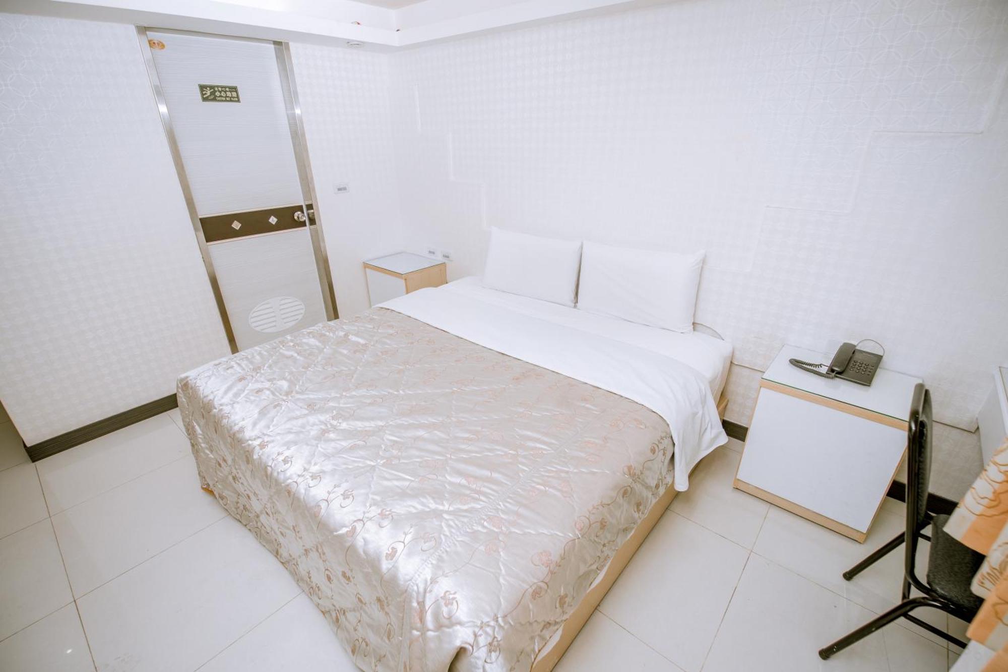 Guide Hotel Taoyuan Fuxing Pokoj fotografie